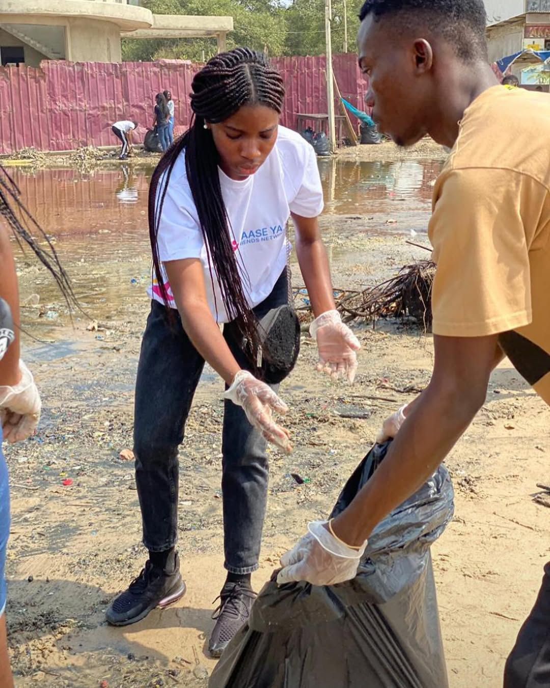 Volunteers picking up litter on the shore